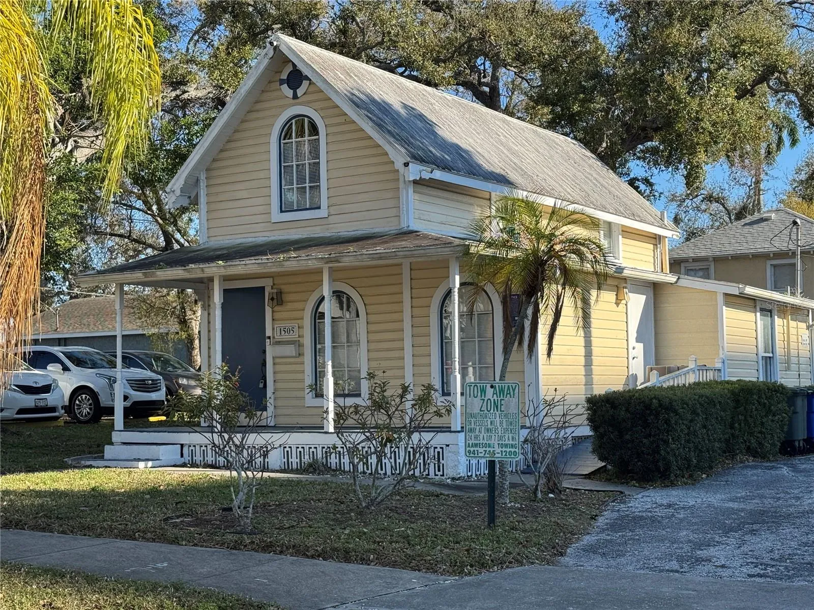 The Yellow House (50' x 100' lot) plus the 100' x 100' vacant corner lot.