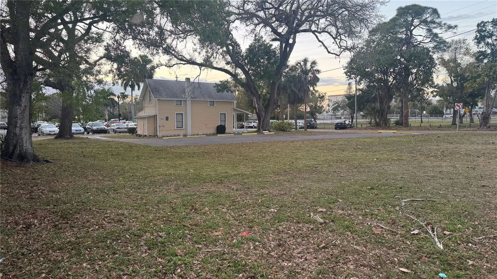 Looking across the vacant lot to "The Yellow House".  Total lant is 150' x 100'.
