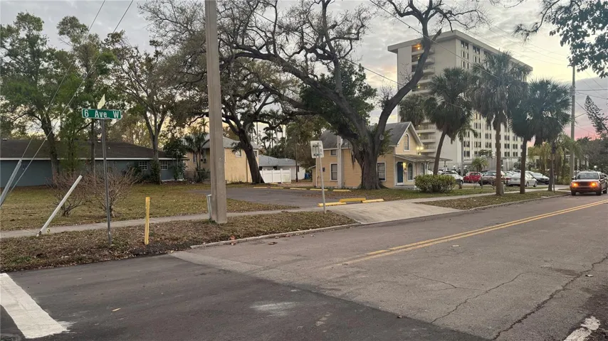Looking Southwesterly at both the Vacant Lot (100' x 100') and "The Yellow House" (50' x 100').  Being sold together only.