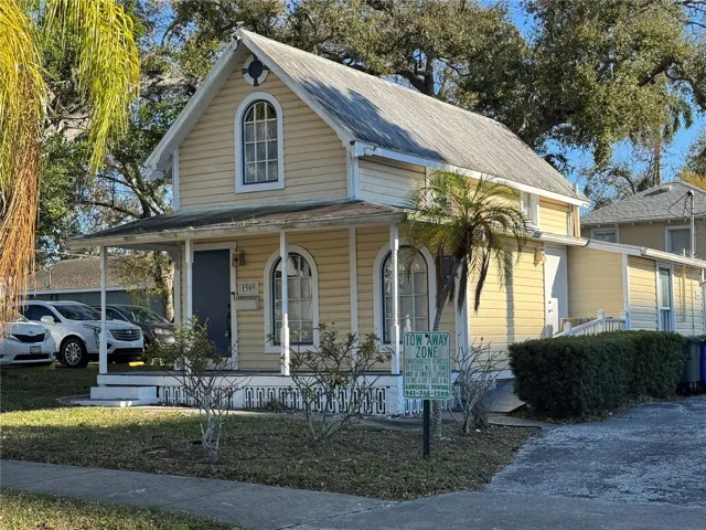 The Yellow House (50' x 100' lot) plus the 100' x 100' vacant corner lot.