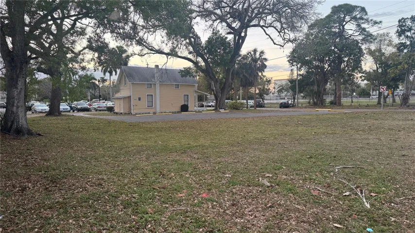 Looking across the vacant lot to "The Yellow House".  Total lant is 150' x 100'.