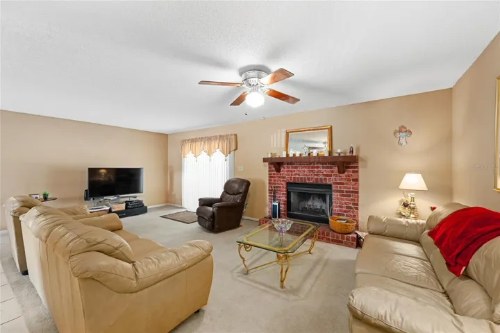 Living Room with Wood Burning Fire Place