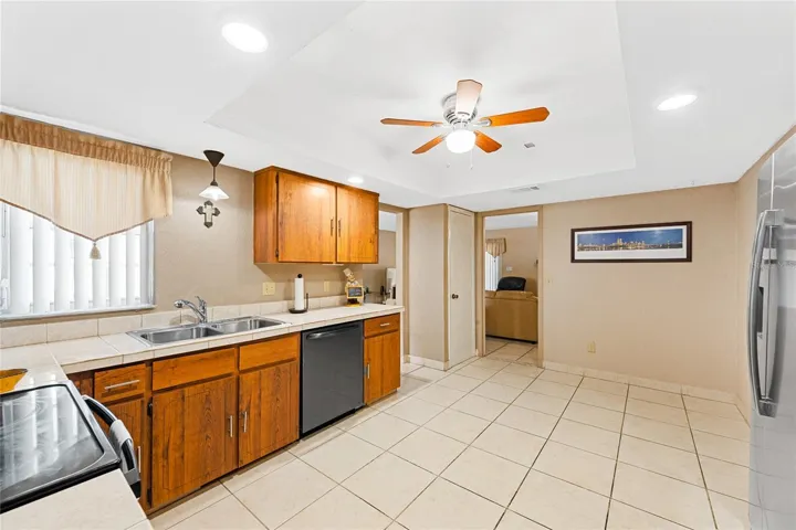Kitchen looking toward Living Room on the right and Dining Room on left