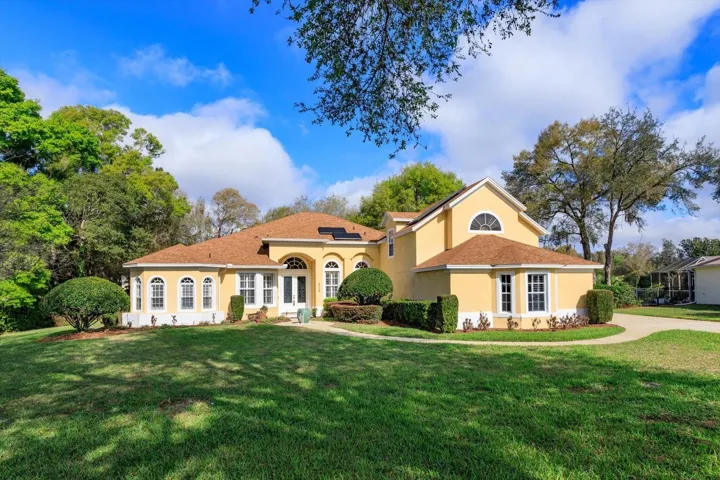 Lovely Rock Springs Ridge home with beautiful, mature trees.  Side load three car garage.  Roof replaced in 2023.