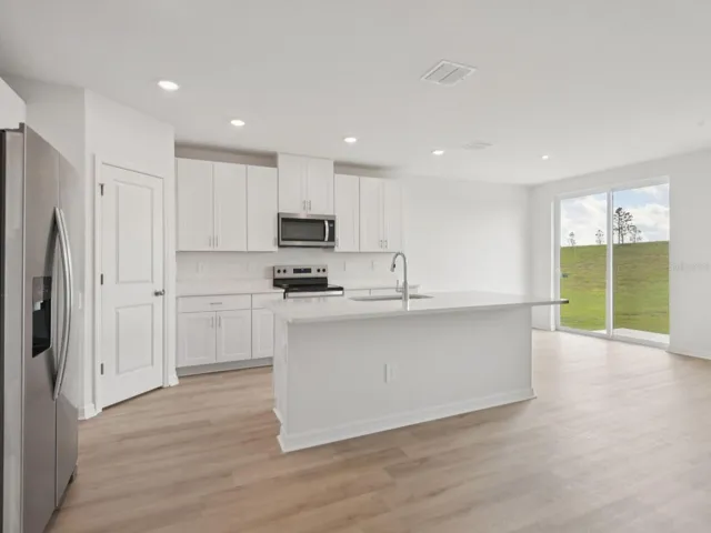 Interior photos are not of the actual home but are photos of the builder home with the same floorplan with similar interior finishes and features.
