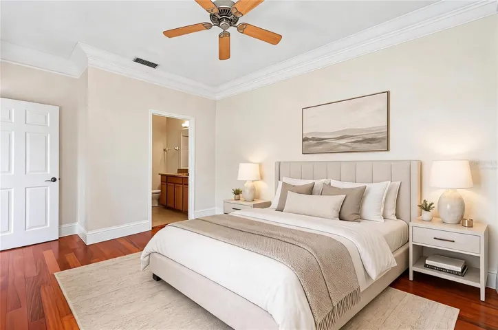 Light filled main floor primary suite. Virtually Staged.