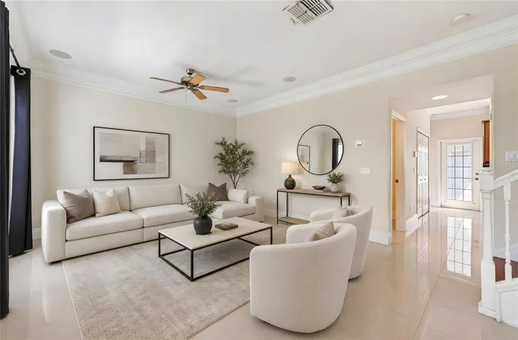 Open concept living and dining with a seamless flow into the kitchen. Virtually Staged.