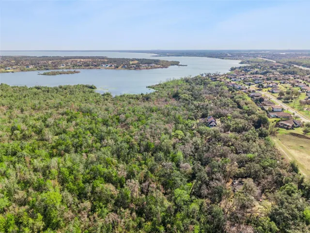 Aerial looking East, Lot is next to new build in fore ground