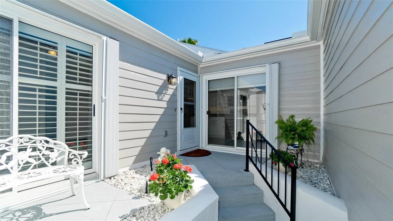 STORM SHUTTERS AT FRONT ENTRY &amp; LANAI