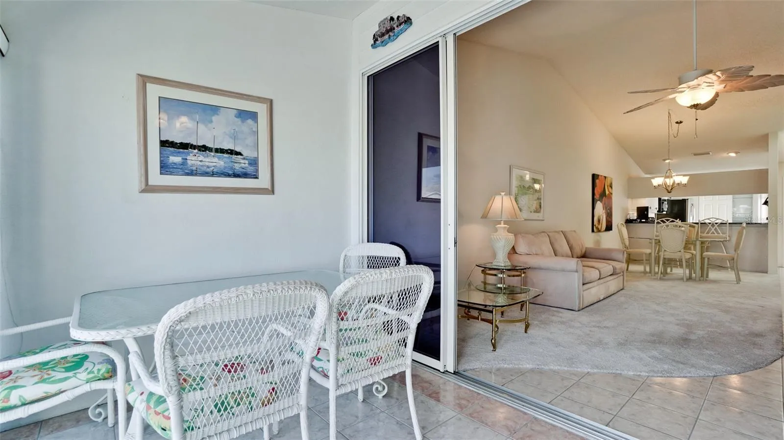 FLORIDA ROOM GLASS ENCLOSED LEADS TO DECK