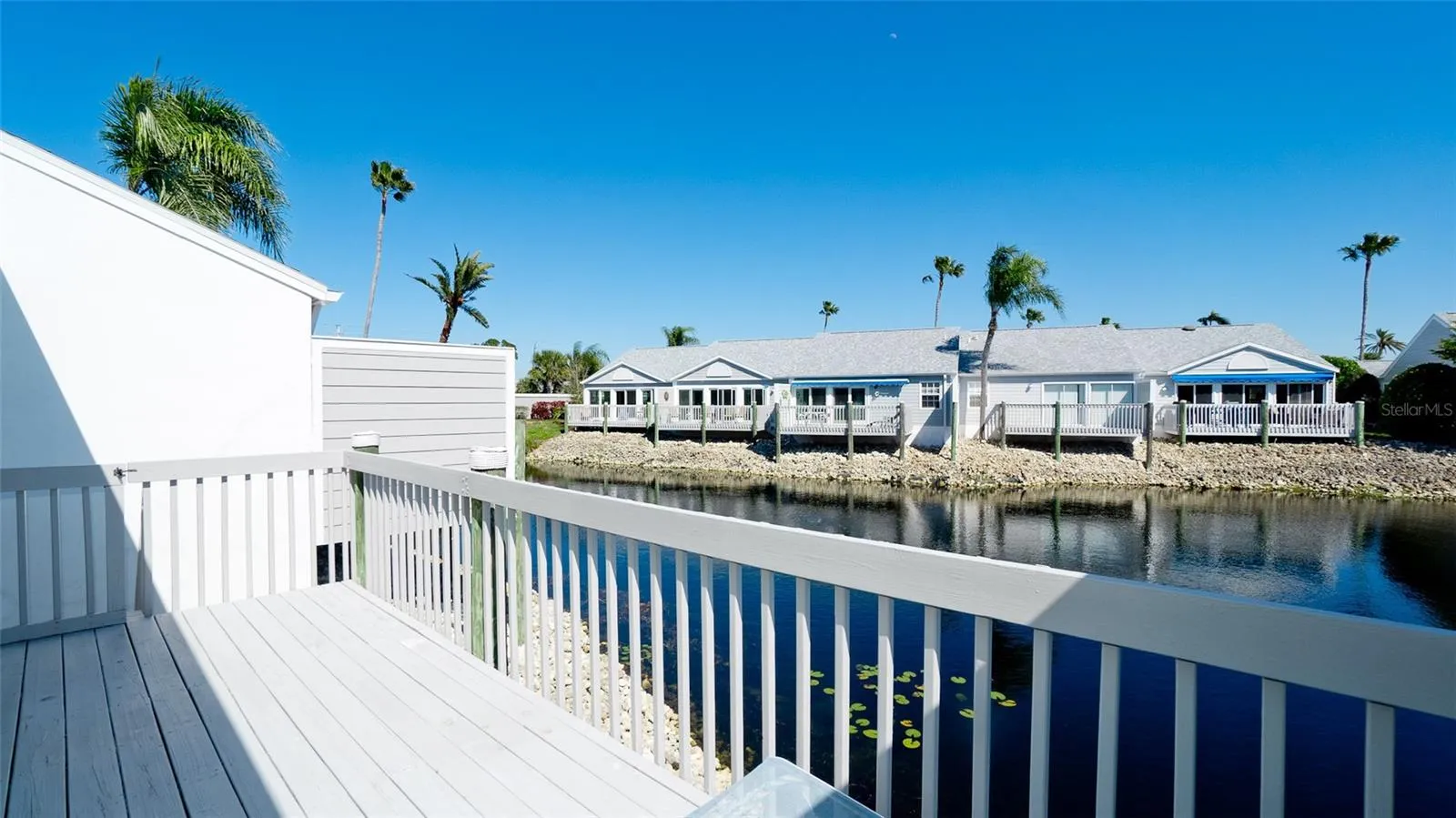 LARGE DECK OVERLOOKING LAKE