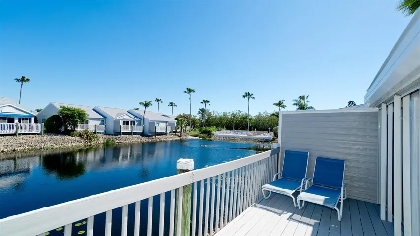LAKEFRONT VILLA WITH 2 CAR GARAGE IN PERICO BAY CLUB