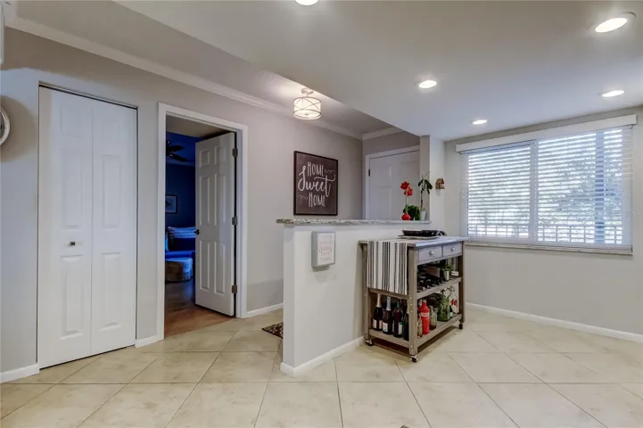 From kitchen, you can go into 2nd bedroom. Note pantry closet to the left of 2nd bedroom.