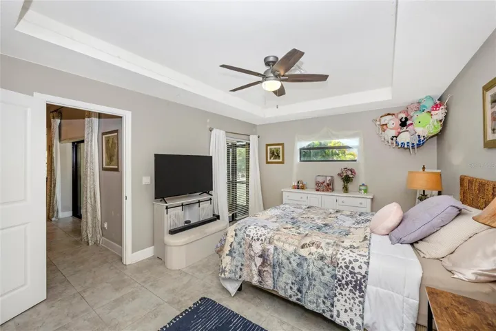 PRIMARY BEDROOM with walk-in closet and en-suite bathroom.