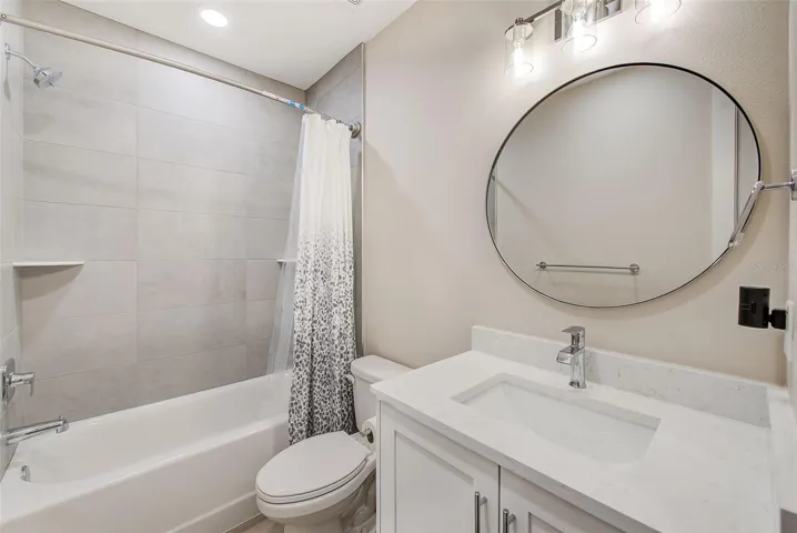 Bathroom 3 with quartz counters.