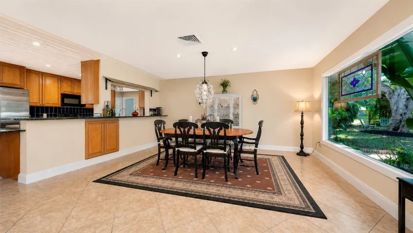 Virtually enhanced to illustrate a lighter whitewashed wood ceiling finish.