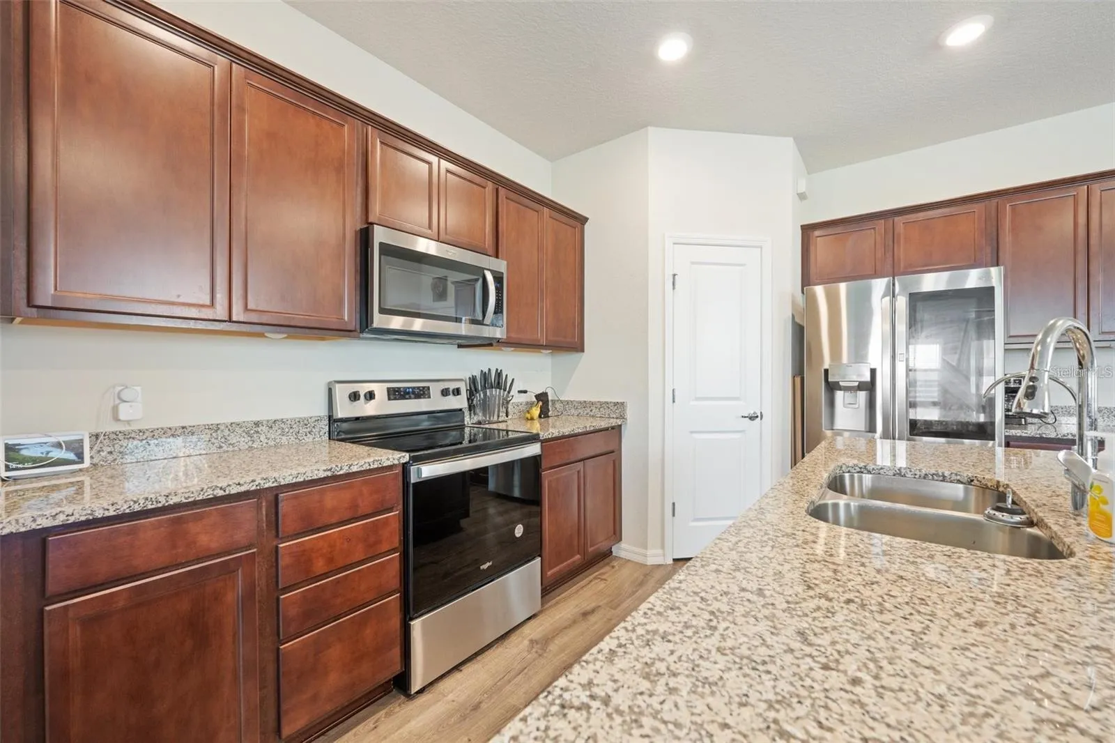Granite countertops shine.