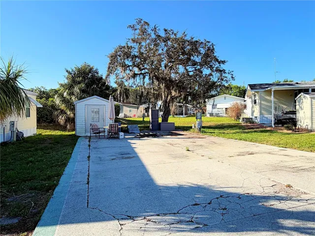 60x40 lot paved lot with storage shed