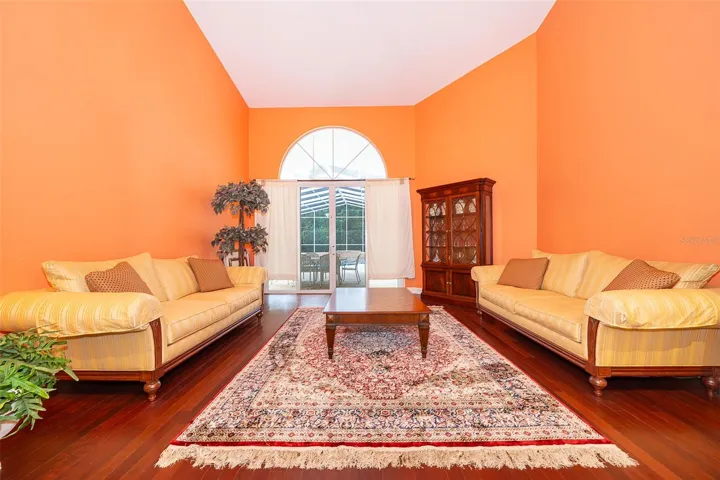 Living Room w/ Pool Access Sliding Door