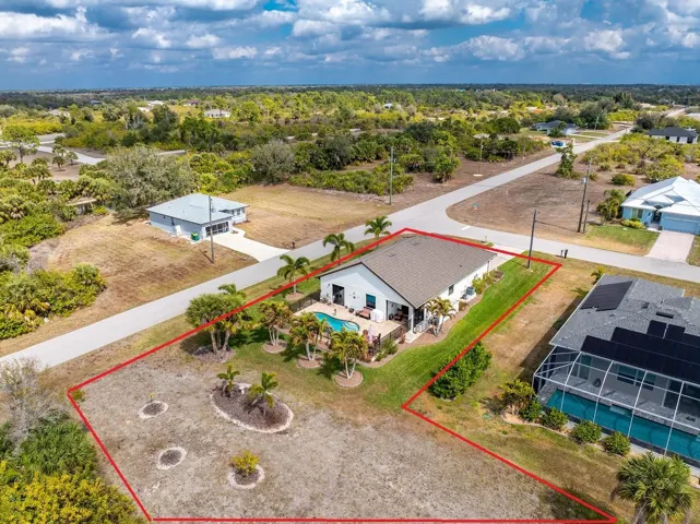 The lot behind the house is a buildable lot and is included!