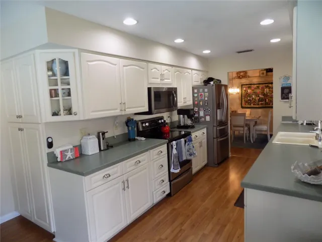 Attractive Kitchen with recessed lighting.