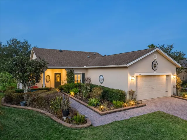 Front of Home with Luxury Landscaping