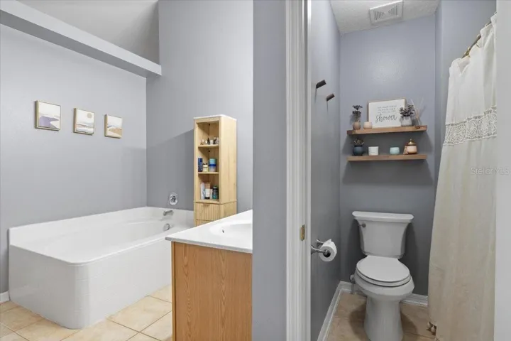 Primary Bathroom Toilet and Shower Room with view of Bathroom