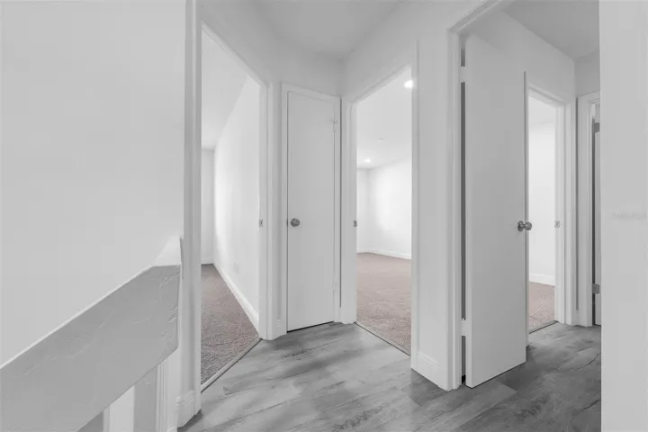 top of the stairs - opens to both bedrooms, bath, and linen closet.