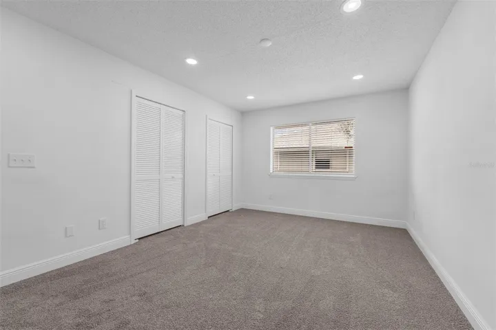 Owner's bedroom with double doors on hugecloset