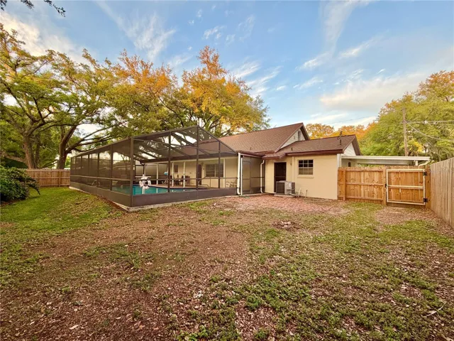 The yard is completely fenced in.