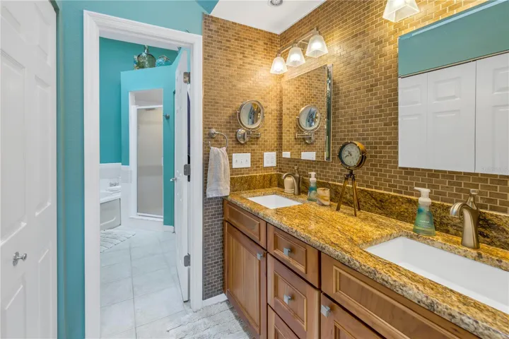 ensuite bath with dual sinks, shower and garden tub
