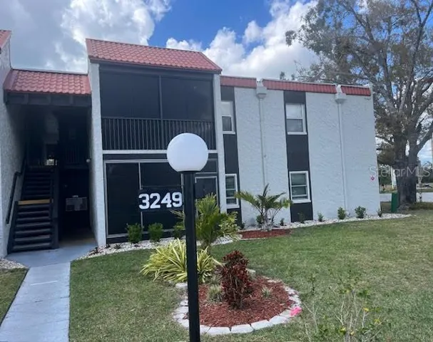 Exterior - walkway from parking to unit.