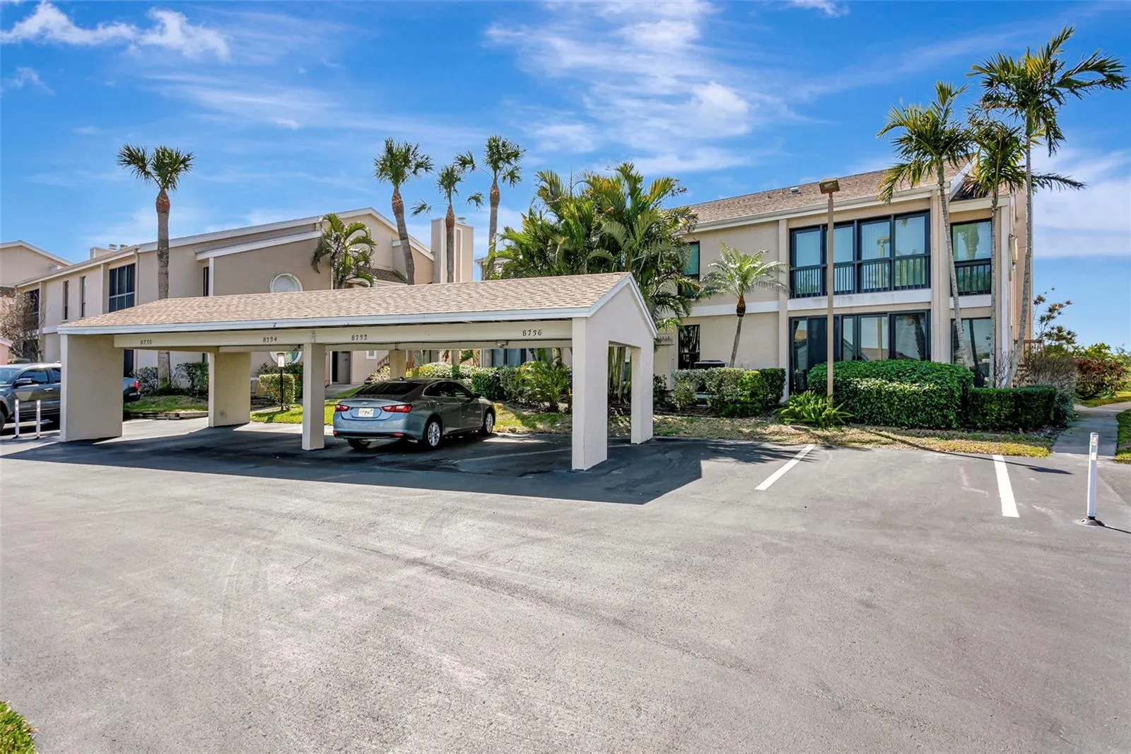 Front of unit &amp; covered parking space