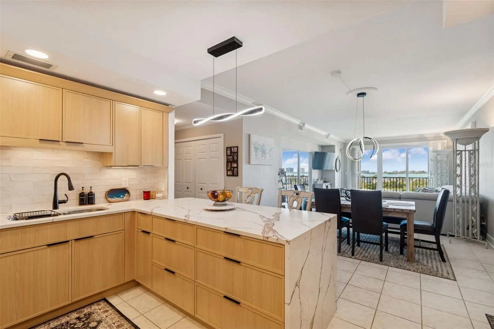 Gorgeous New Open Kitchen!  Open floor plan: kitchen, dining room and living room with water view!!