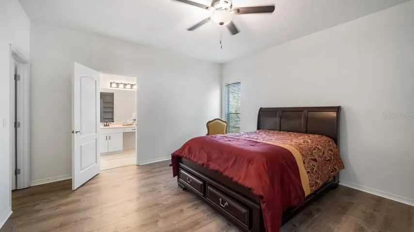 Large Bright Primary Bedroom With Walk In Closet