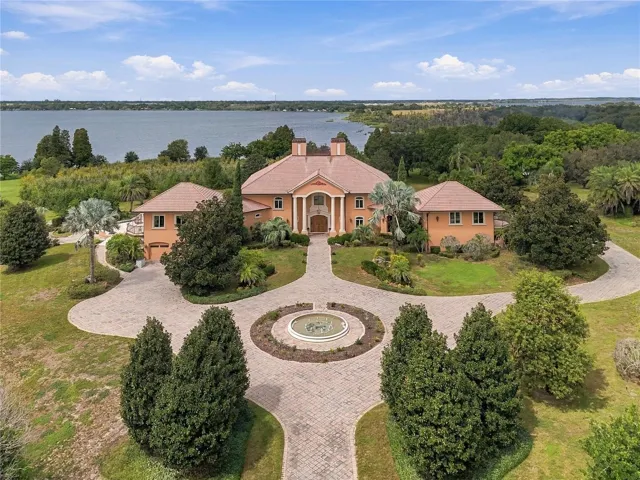 A rare opportunity to own one of Auburndale’s most impressive private estates. Set on 44.30 beautifully landscaped acres with more than 2,300 feet of water frontage, this remarkable property offers unmatched privacy, scale, and natural beauty.