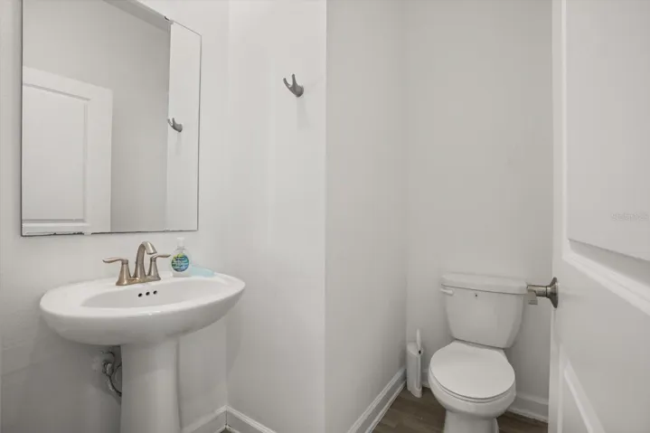 Convenient downstairs half bath.