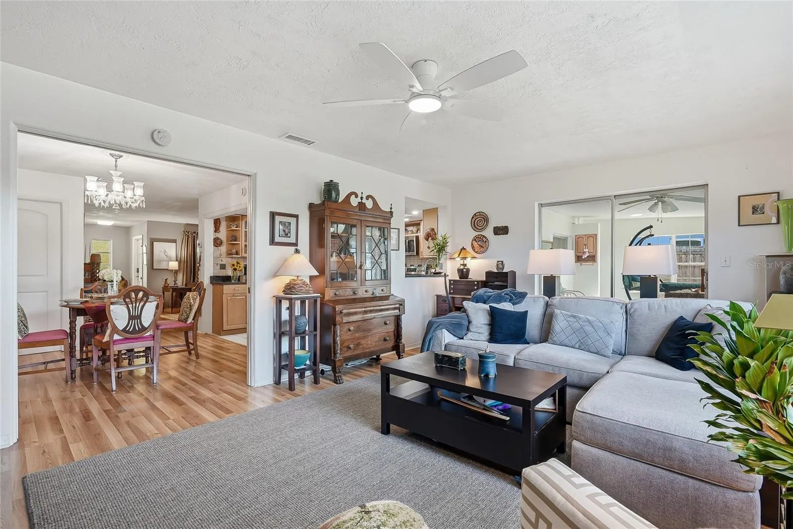 Space to spread out and stay connected, with the family room opening to the dining area and enclosed Florida room.