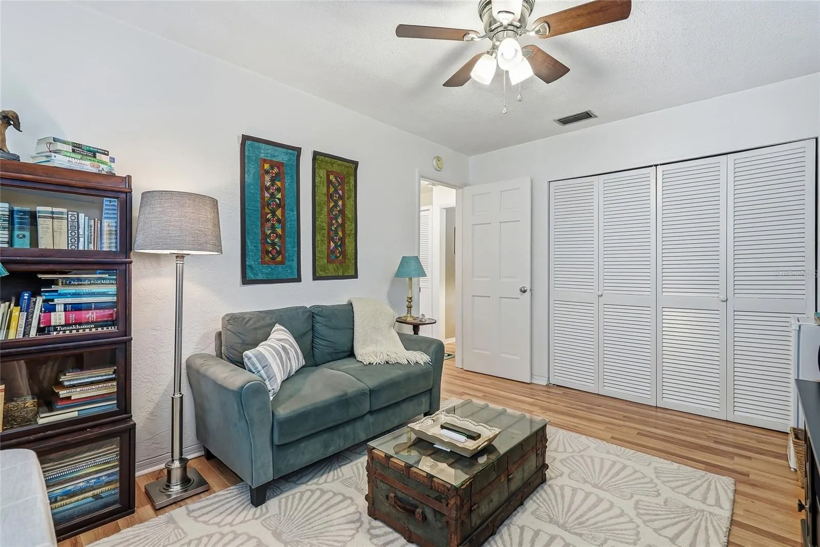 Make this third bedroom work for you as a sleeping space, home office, or cozy den, with a wide closet for everyday storage.