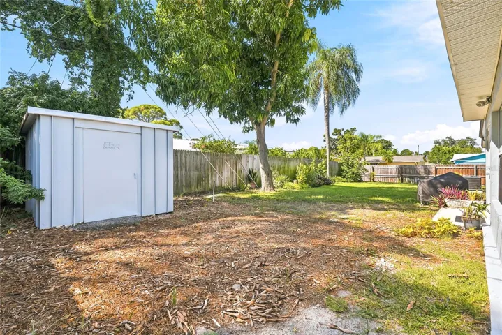 A handy backyard shed provides space for gardening tools and outdoor essentials, leaving more room to enjoy your surroundings.