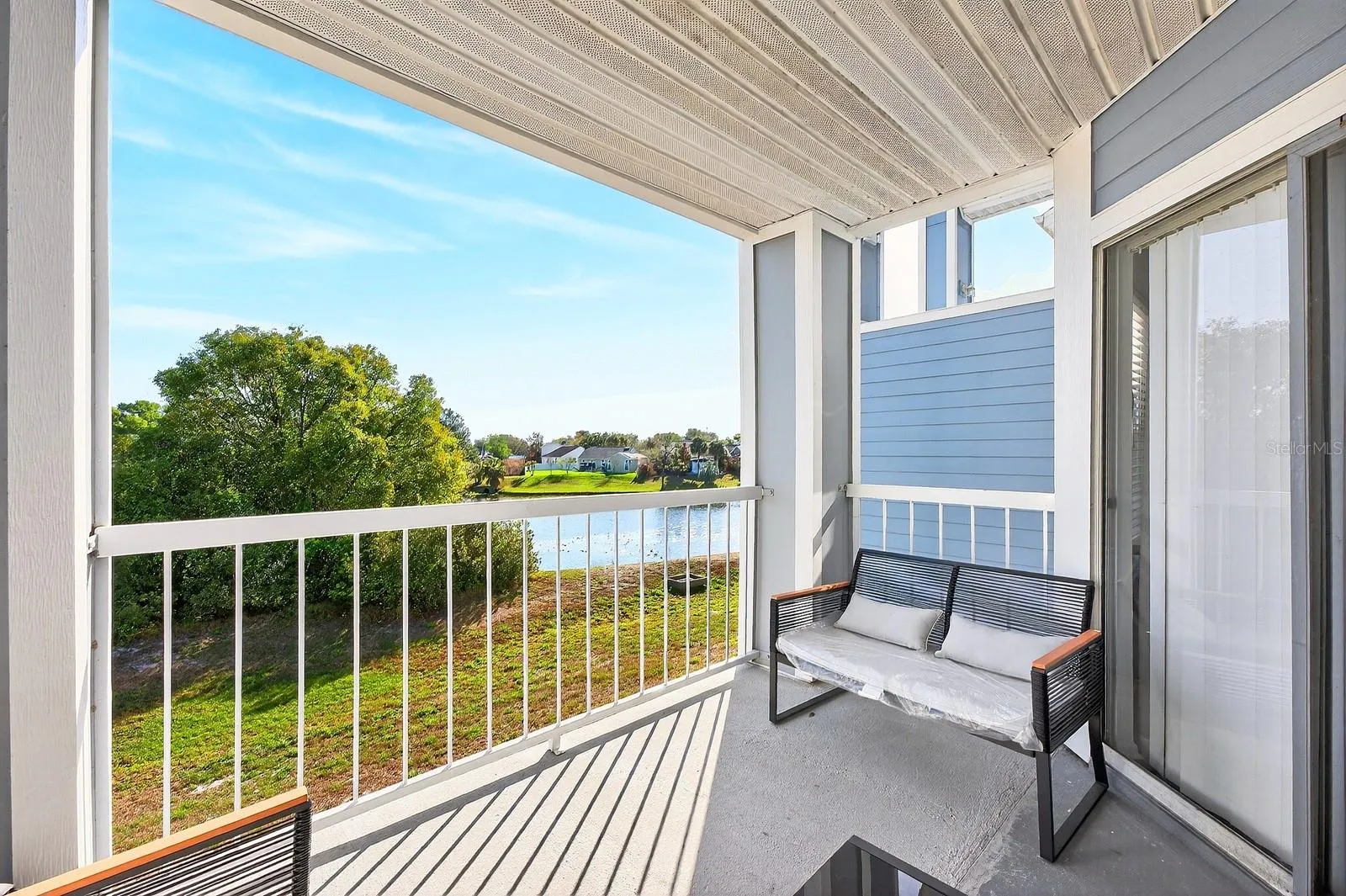 Balcony has water views.