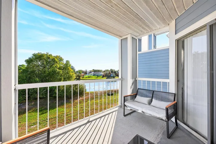 Balcony has water views.