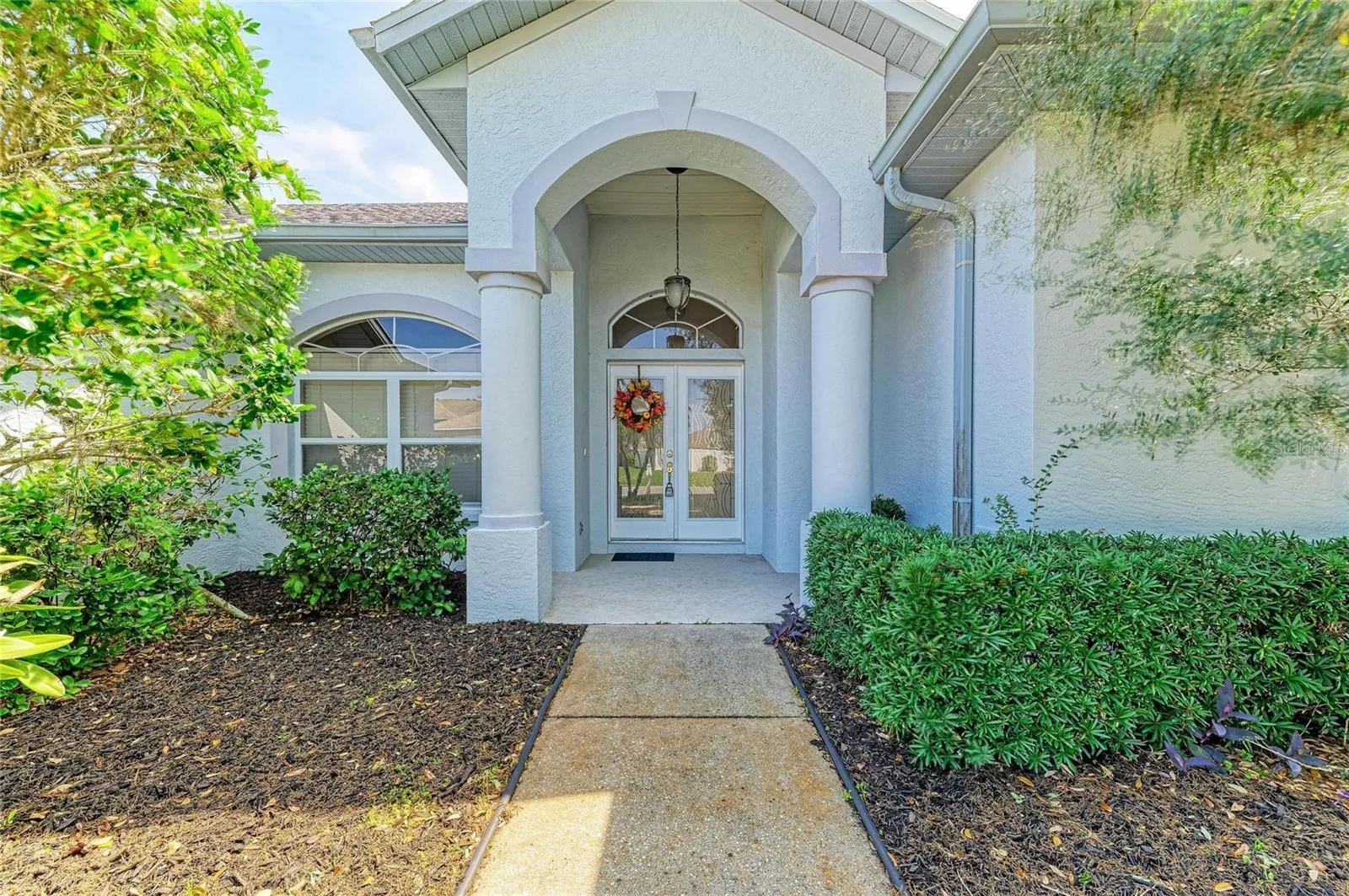 Covered entrance with double doors for easy move-in