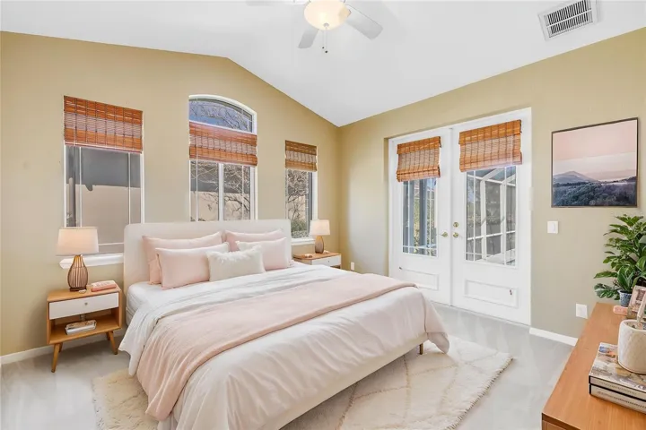 Bedroom 2 with access to the pool & outdoor space