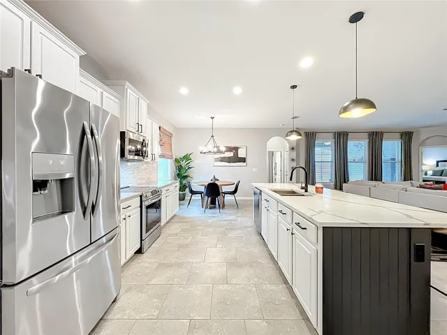 Large kitchen with plenty of space for entertaining or cooking.