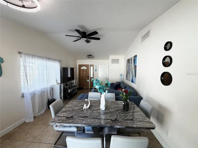 Living Room/Dinning room combo view from the kitchen entrance