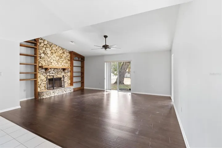 Family room with wood burning fireplace