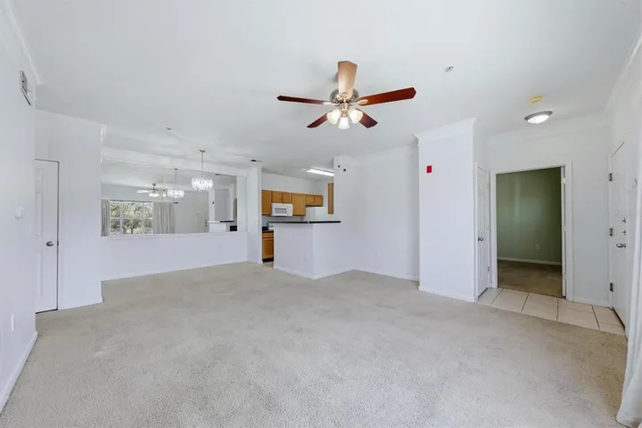 Living room, Kitchen and entrance to Primary Bedroom.