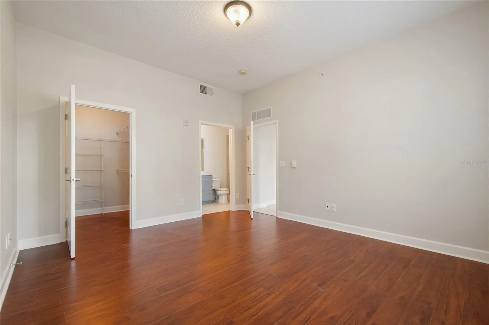 PRIMARY CLOSET AND BATHROOM