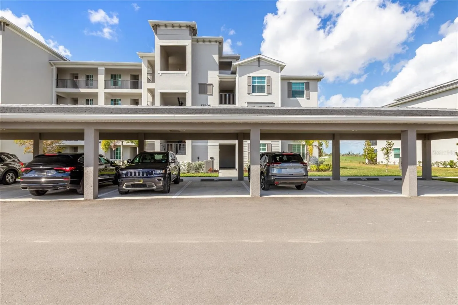 Assigned Carport plus plenty of guest parking